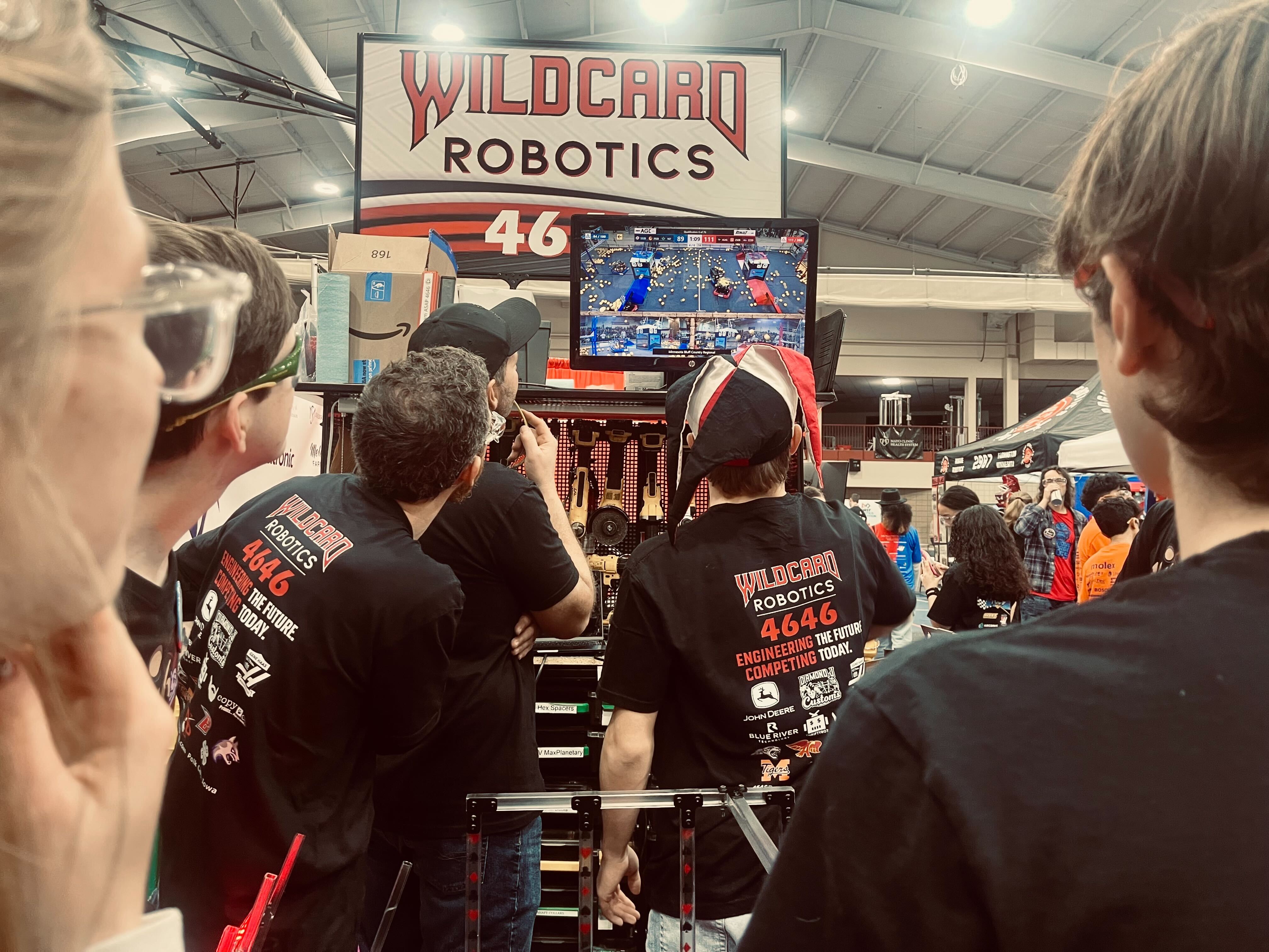 Watching a match from the pits.